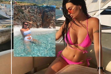 Zaimina me pozë joshëse e lagur në det